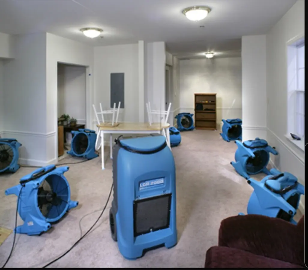 Air movers and dehumidifier setup for Water Extraction & Removal in Middle